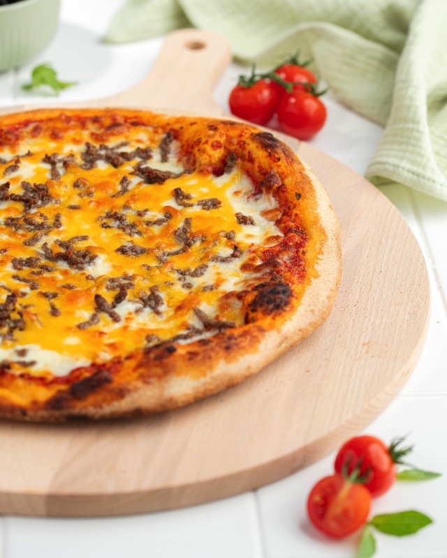 Solution clé en main de pizzas prêtes à cuire sous vide pour le snacking pendant les Jeux Olympiques à Paris.