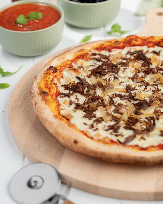 Découvrez nos pizzas prêtes à cuire de qualité supérieure à Dijon, Bourgogne-Franche-Comté